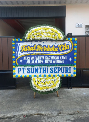 Papan Bunga Duka di Pintu Langit Jae