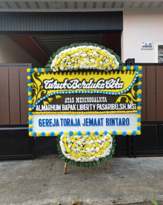 Papan Bunga Duka di Pintu Langit Jae