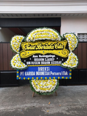 Papan Bunga Duka di Pintu Langit Jae